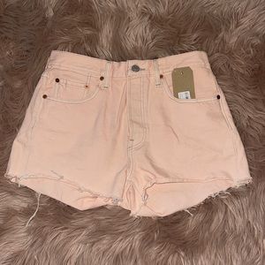 Light baby pink Levi’s shorts